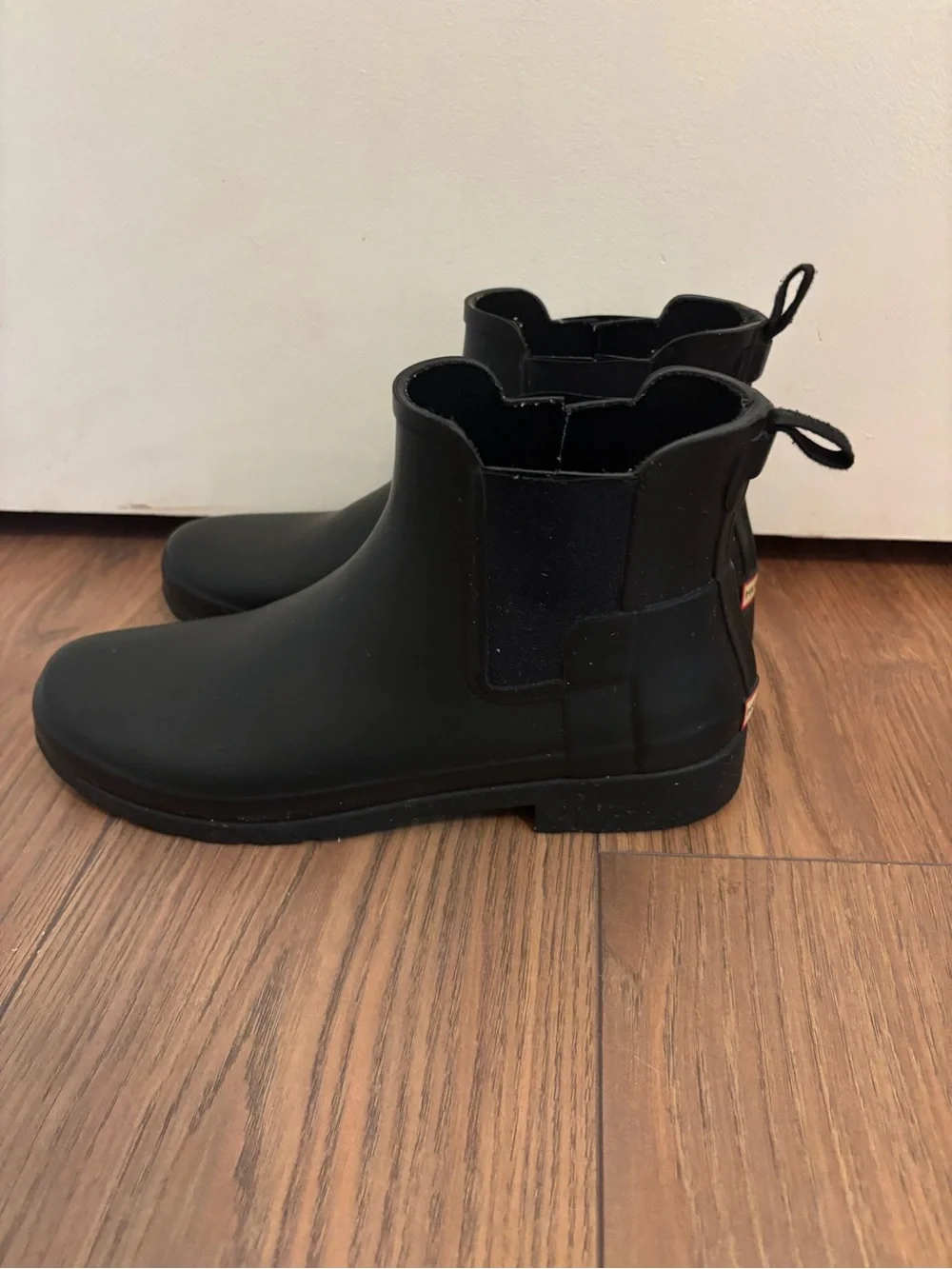 Hunter Black Rubber Slip-On Rain Boots with Treaded Outsole